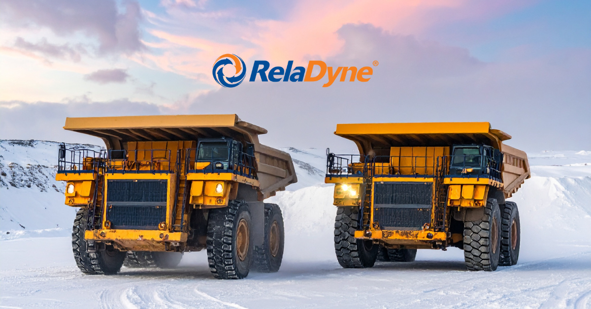 Mining Equipment Operating in Winter Conditions A wide-angle shot of mining trucks, excavation equipment, or loaders working in snow or cold climates.